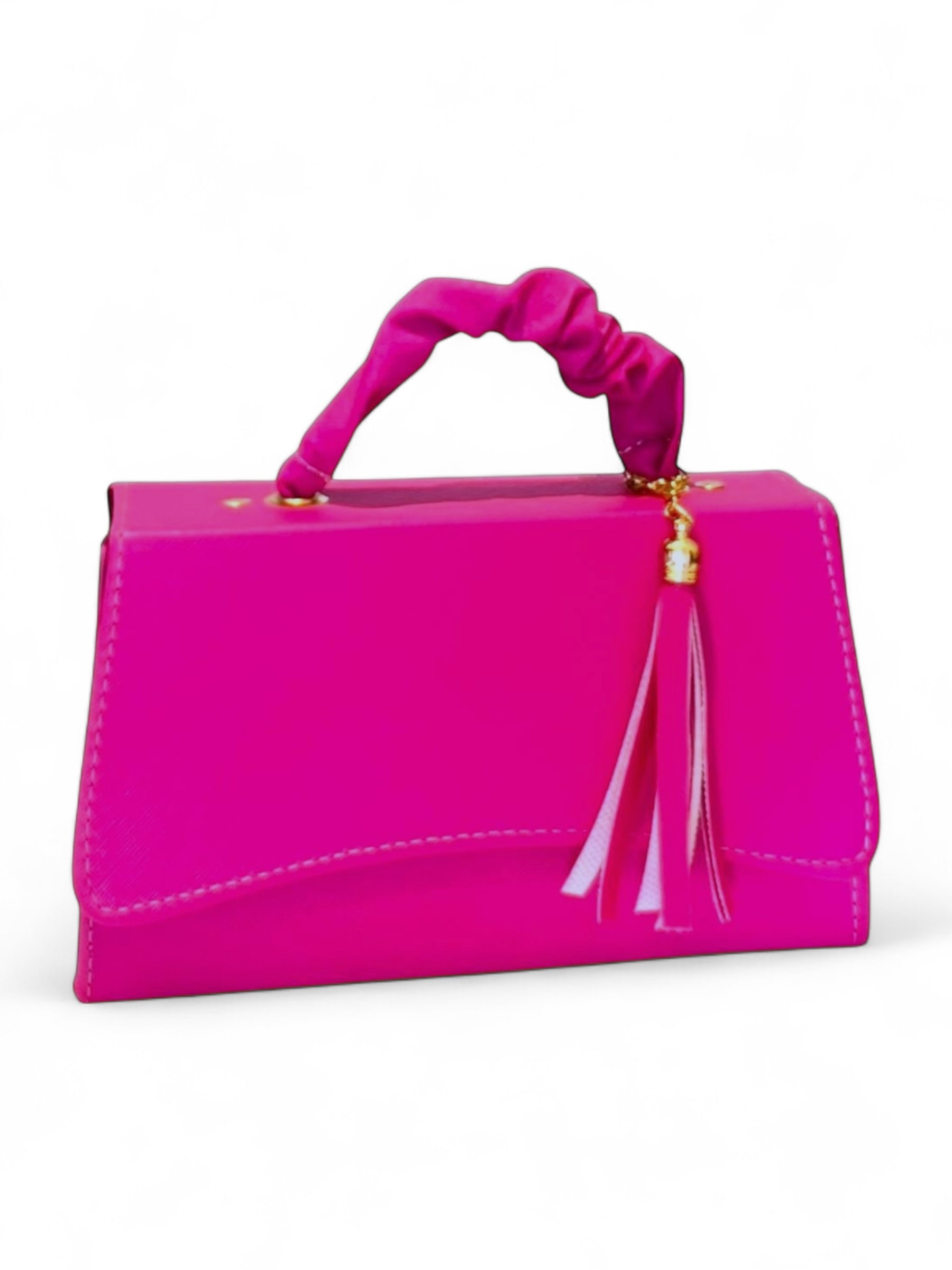 DALALI Bolsa mini tipo handbag chaparrita con borla y correa ajustable – color fucsia vibrante.