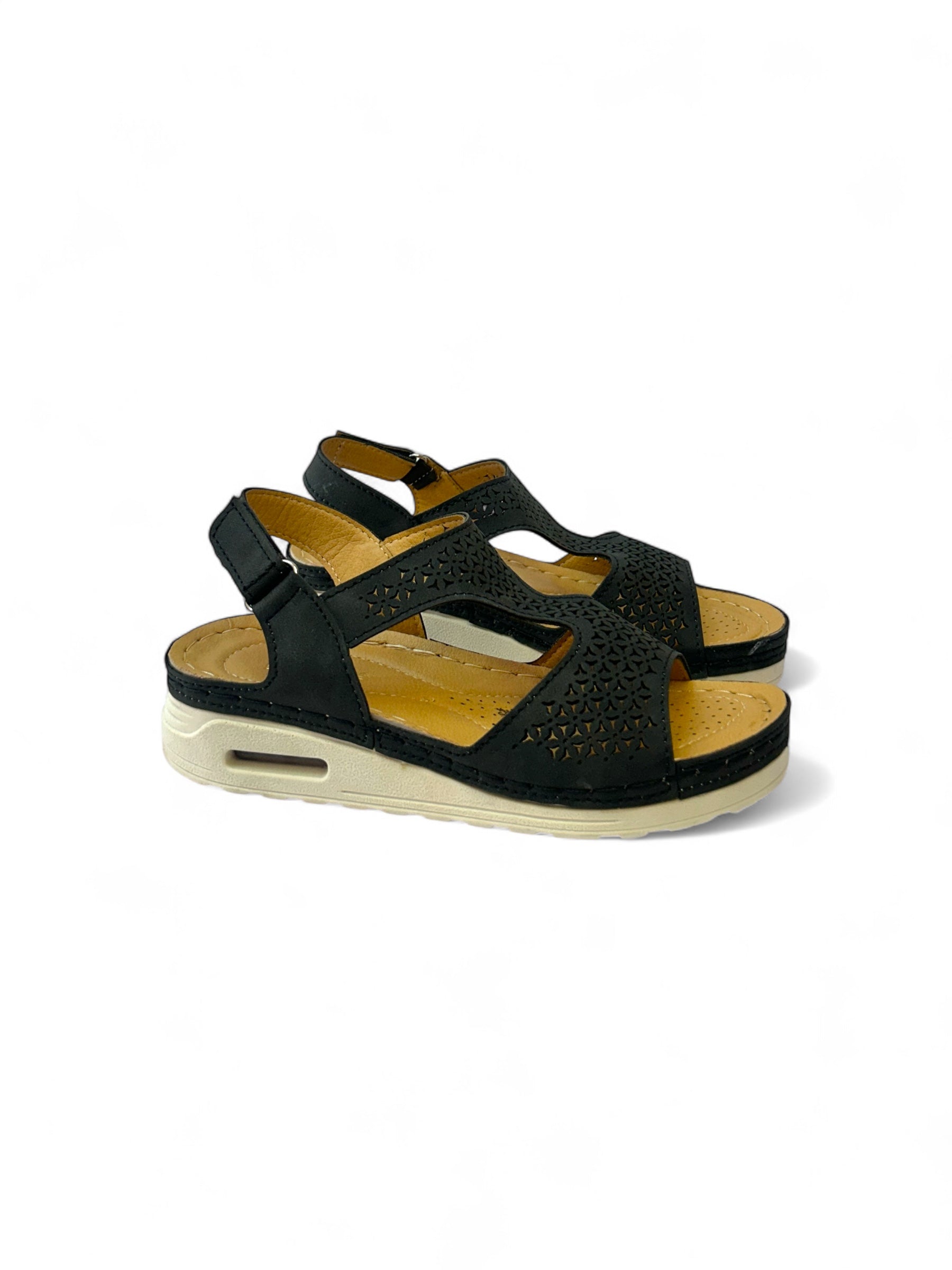 Sandalia de plataforma con ajustable de velcro, plantilla moemoryfoam y la suela con cámara de aire.