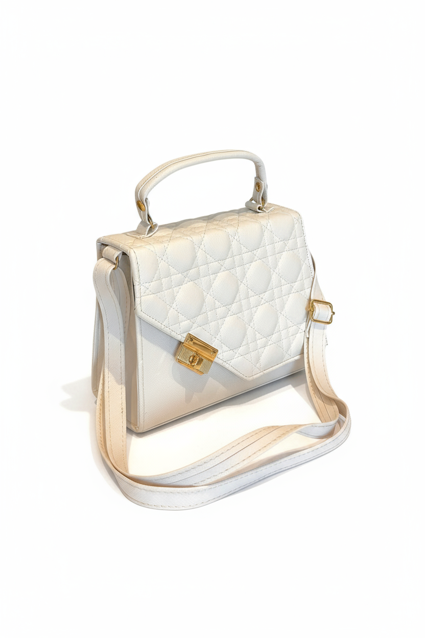 COPAL – Bolsa de mano de diseño acolchada con herraje dorado decorativo