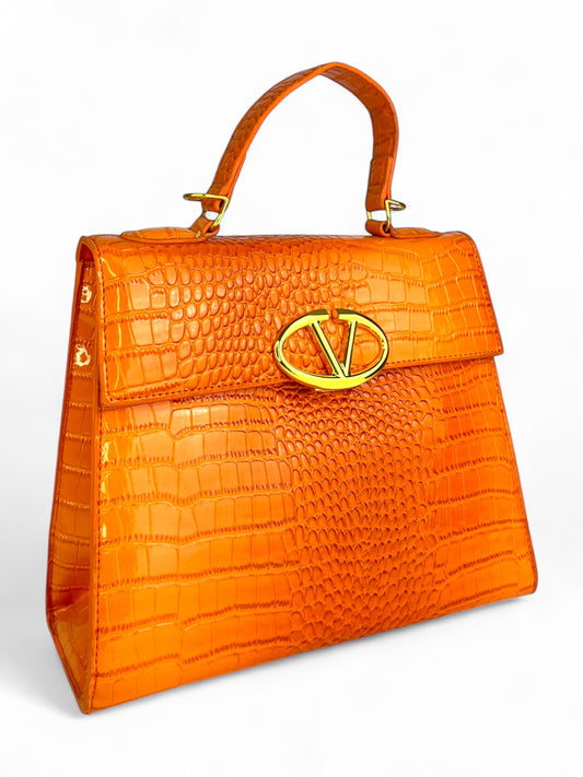 Bolsa tipo charol con textura cocodrilo