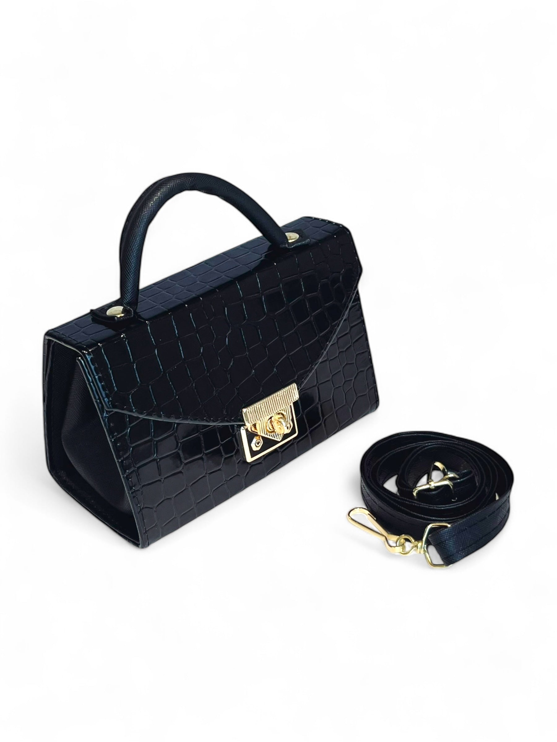 Bolsa para salidas casuales o para niñas pequeñas que desean una bolsa negra de tipo charol con correa desmontable en color negro