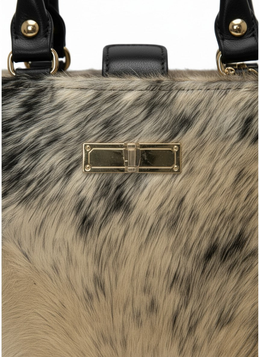 Bolsa de mano 100% piel estructurada con estampado animal print -  DAKOTA