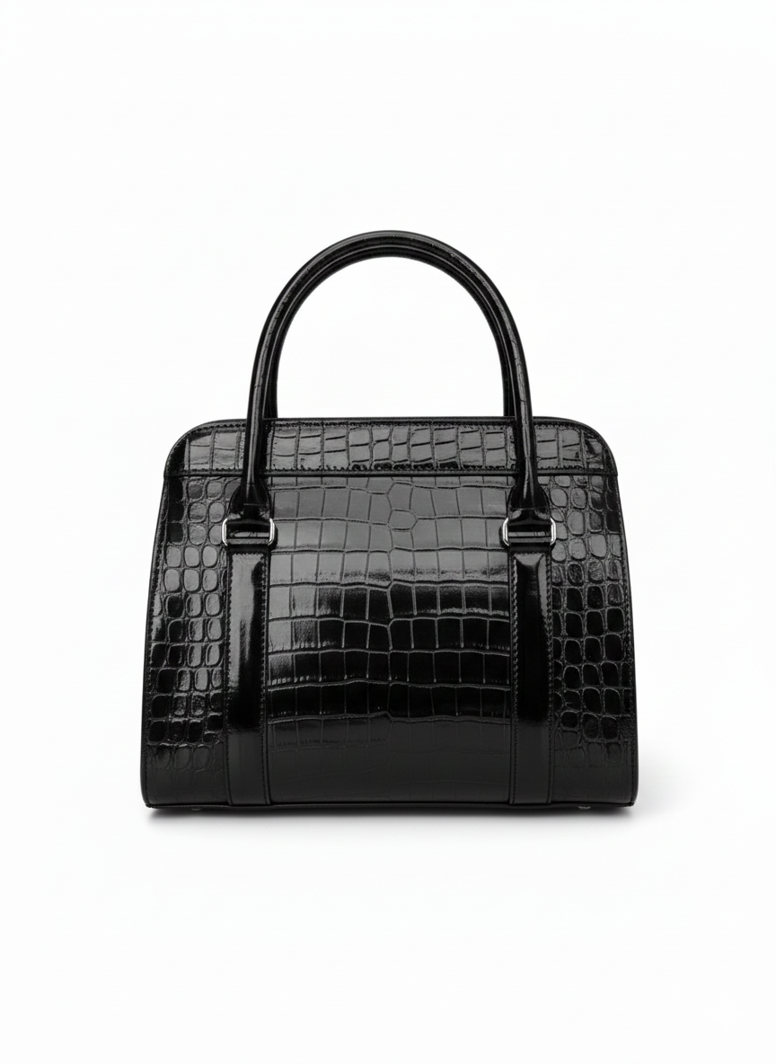 AURA  – Bolsa de mano estructurada en textura de cocodrilo brillante