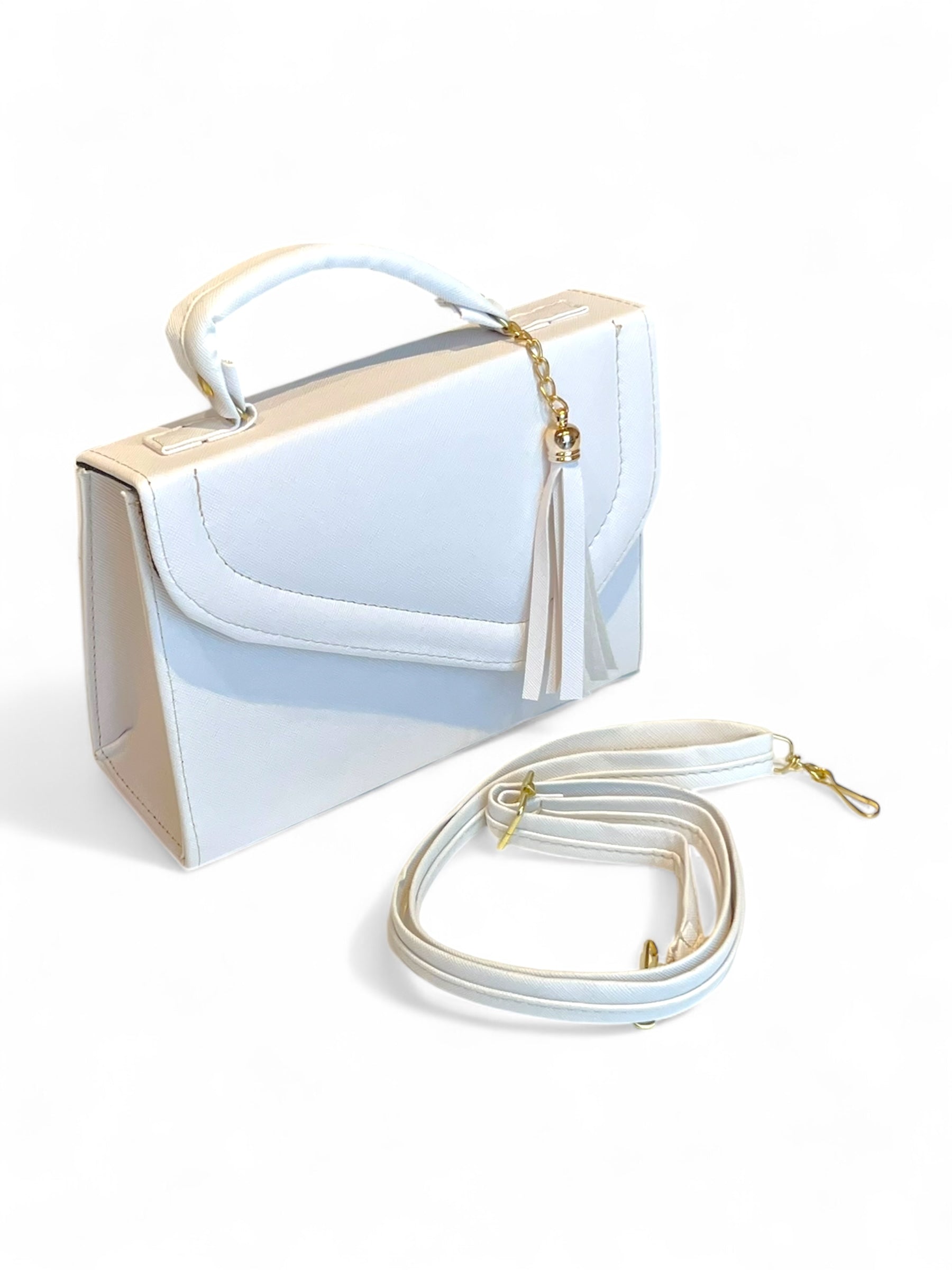 VIENA – Bolso mini crossbody acolchado con borla decorativa