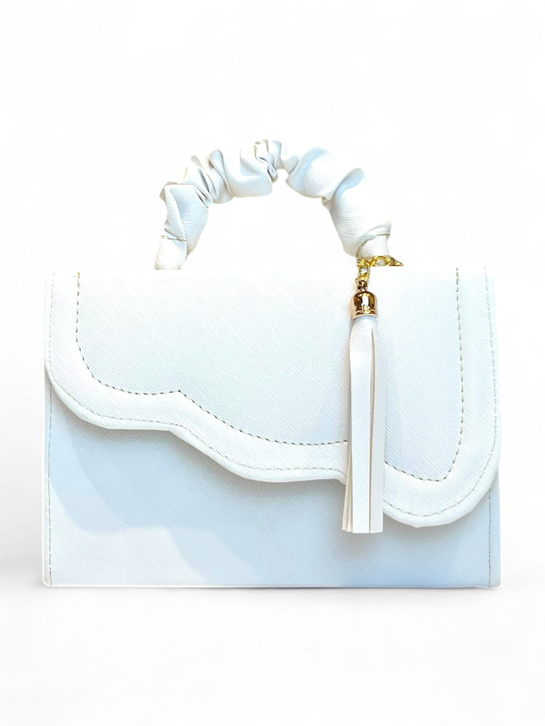 BALI – Bolso mini crossbody con asa trenzada y borla decorativa.