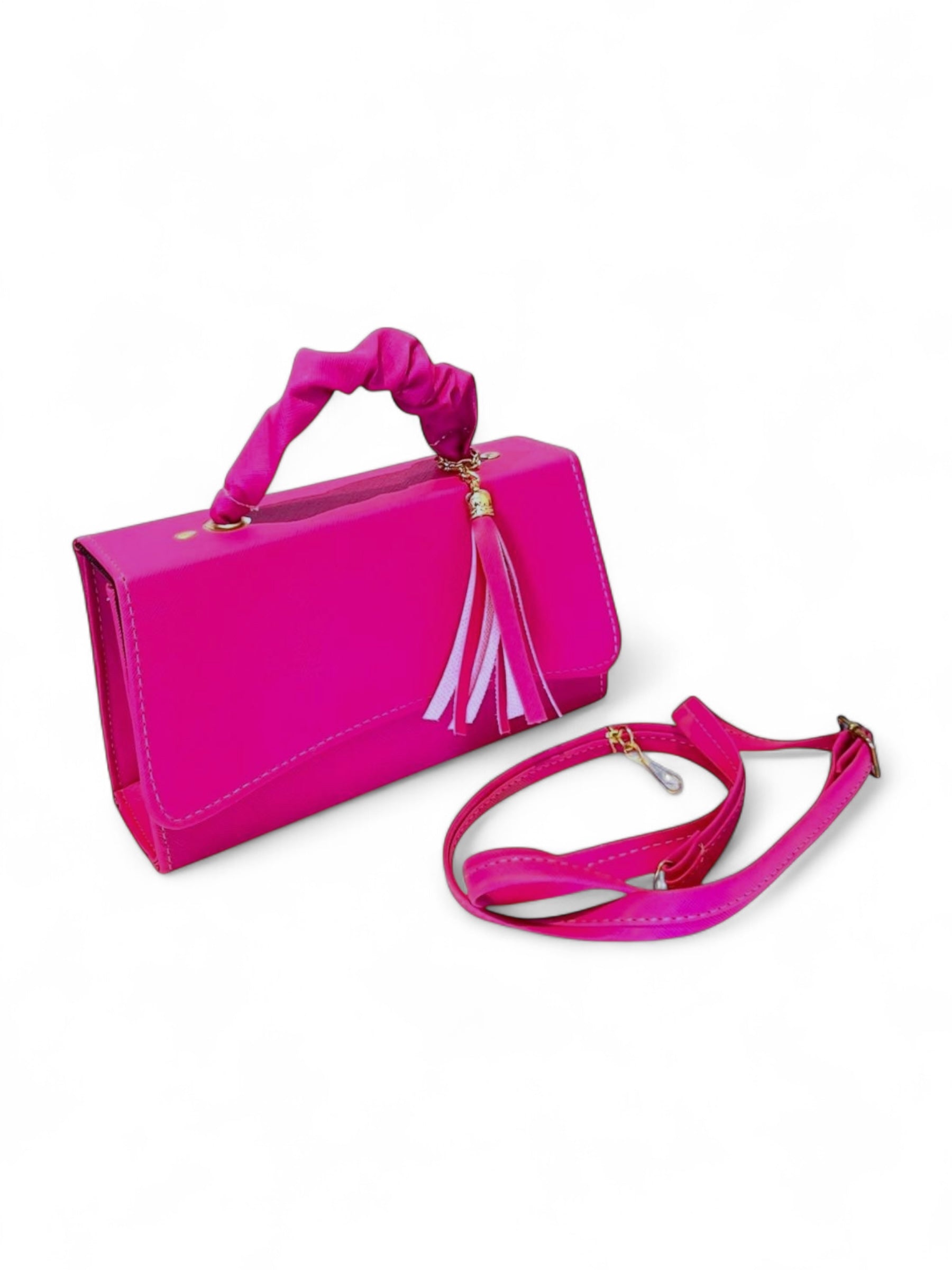 DALALI Bolsa mini tipo handbag chaparrita con borla y correa ajustable – color fucsia vibrante.