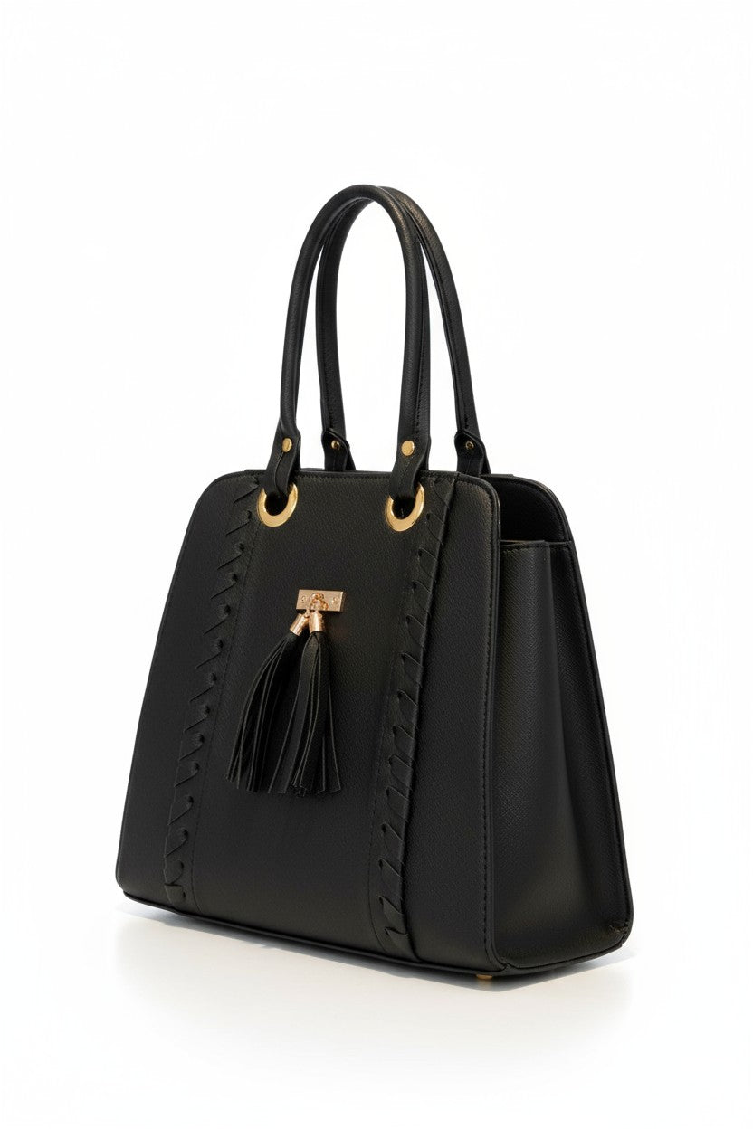 LUZ – Bolsa estructurada con borlas y aros dorados