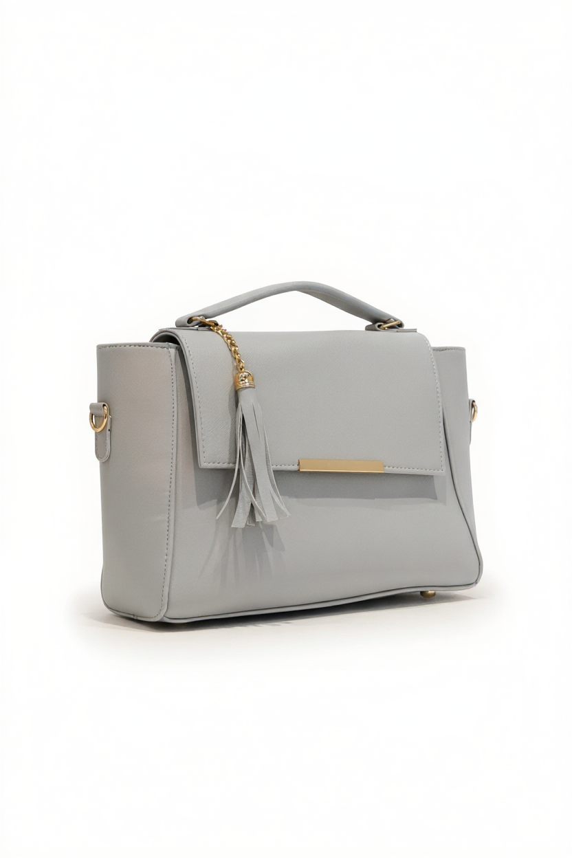 ALMA – Bolso estructurado con correa desmontable y detalle decorativo dorado