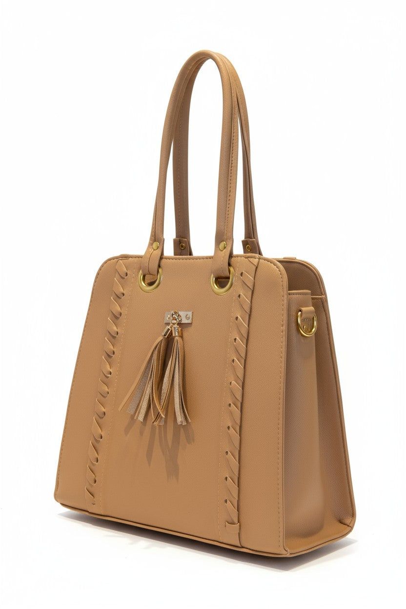 LUZ – Bolsa estructurada con borlas y aros dorados